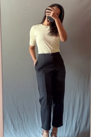 Classic Ivory Ribbed Top with Black High-Waist Trousers