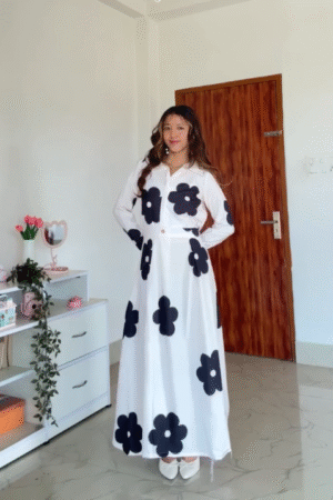 White Maxi Dress with Bold Black Floral Print – Elegant Minimal Chic Look